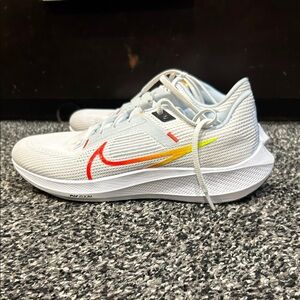 Nike White Sneakers with Red and Yellow Accents
